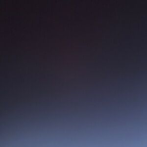 Black faux suede booties with glitter heel